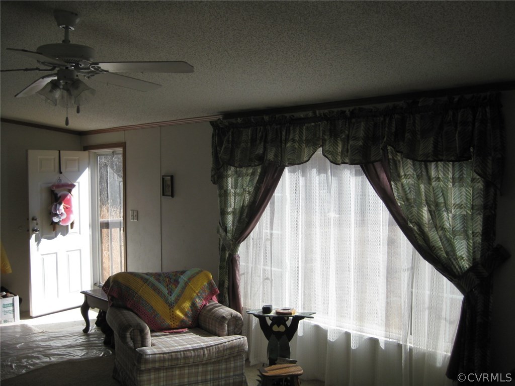 48 Reservoir Road Victoria, VA 23974 - Photo 12 of 26 a living room with furniture and a window