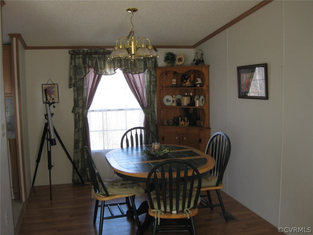 48 Reservoir Road Victoria, VA 23974 - Photo 10 of 26 a view of a dining room with furniture and wooden floor