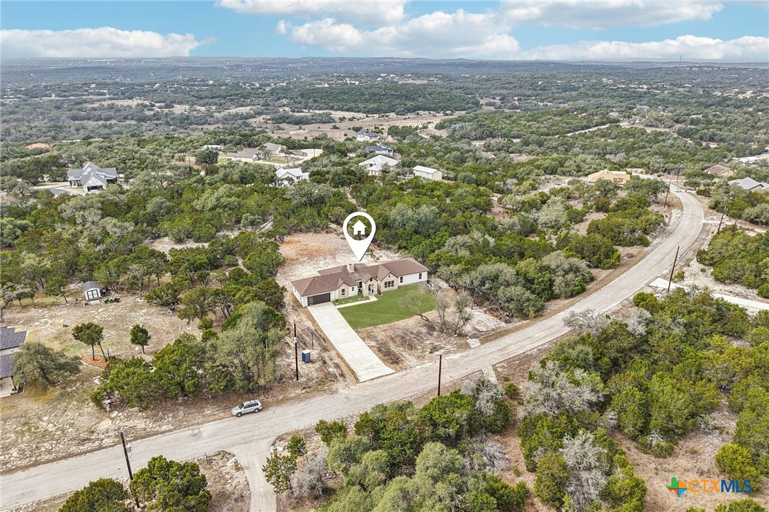 858 Rutherford Fischer, TX 78623 - Photo 35 of 37 an aerial view of residential houses with outdoor space