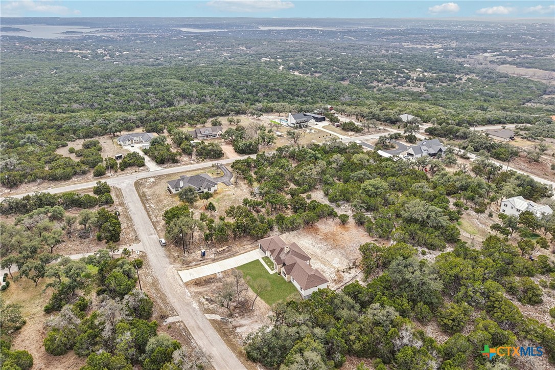 858 Rutherford Fischer, TX 78623 - Photo 36 of 37 an aerial view of residential house and green space