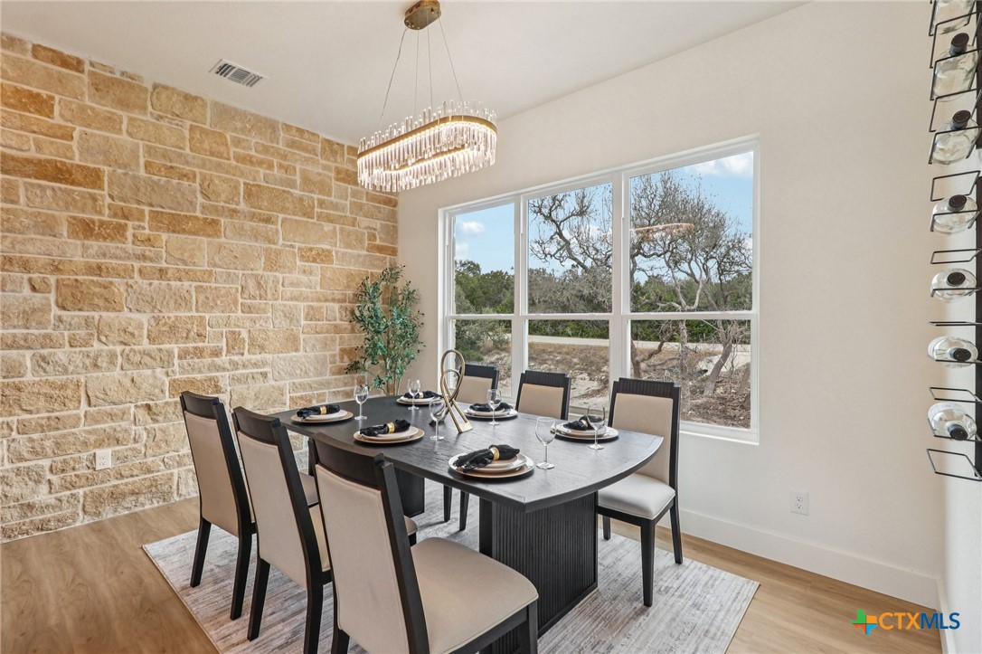 858 Rutherford Fischer, TX 78623 - Photo 5 of 37 a view of a dining room with furniture window and outside view