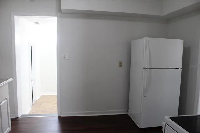 a view of cabinet with wooden floor