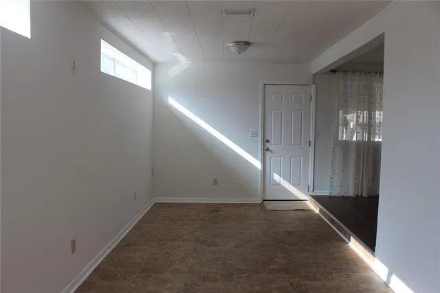 a view of a hallway with entryway