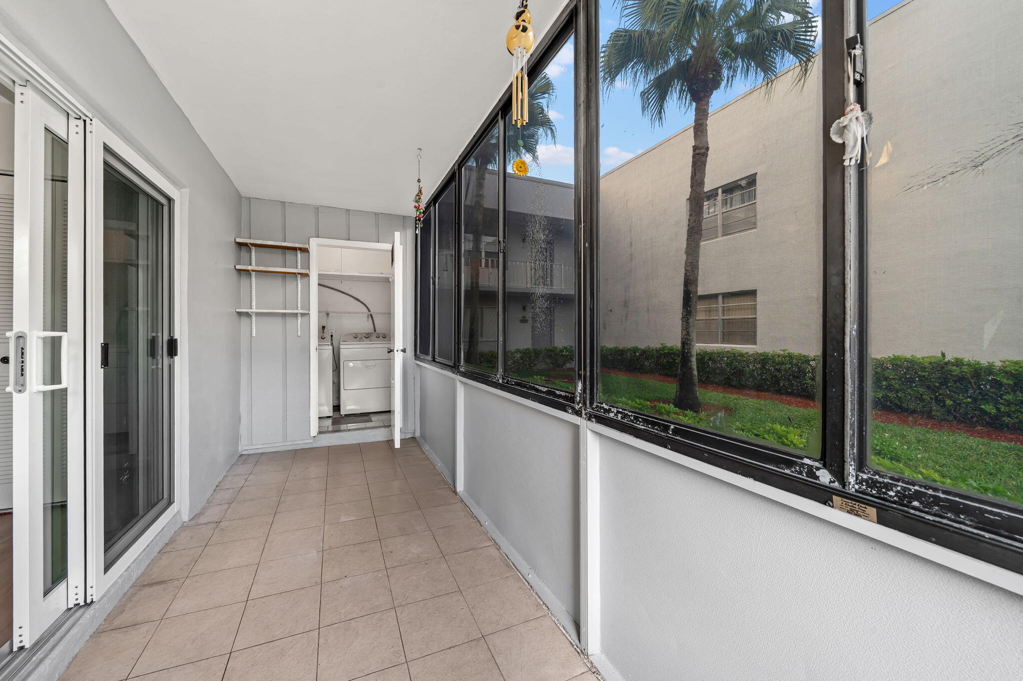 932 Flanders T Delray Beach, FL 33484 - Photo 18 of 28 a view of a building from a balcony