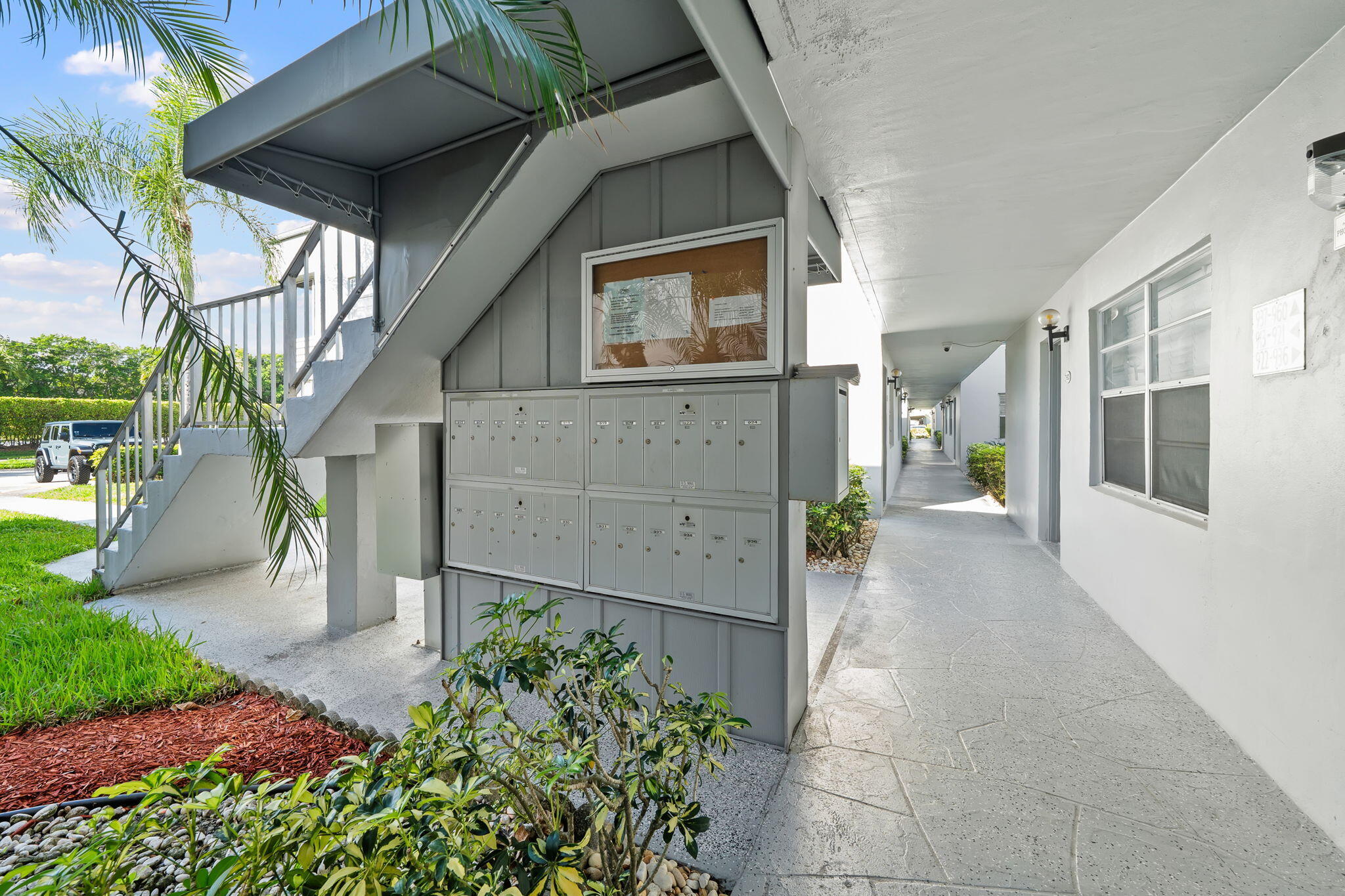 932 Flanders T Delray Beach, FL 33484 - Photo 20 of 28 a view of a back yard of the house