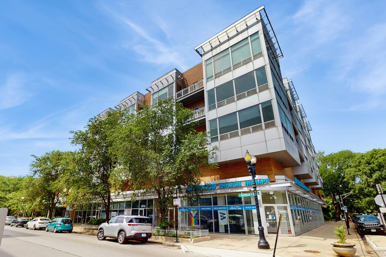 3920 North Sheridan Road, Unit 411 Chicago, IL 60613 - Photo 1 of 28 a view of a building with a street