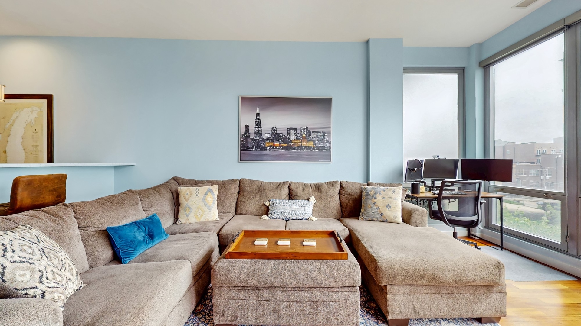 3920 North Sheridan Road, Unit 411 Chicago, IL 60613 - Photo 13 of 28 a living room with furniture and a large window