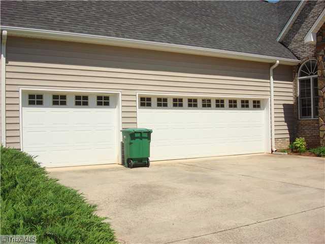 6365 Robinhood Road Pfafftown, NC 27040 - Photo 2 of 16 Exterior Front. XXL Side Entry 3 Car Garage...approximatly 24 x 35 7"