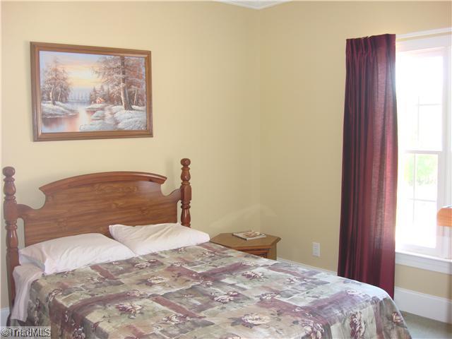 6365 Robinhood Road Pfafftown, NC 27040 - Photo 11 of 16 2nd Bedroom. One of the two secondary bedrooms joined by a jack-n-jill bath.