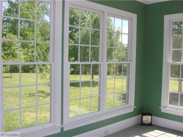 6365 Robinhood Road Pfafftown, NC 27040 - Photo 12 of 16 Sunroom. Slip away in the sunroom to read a book or your Sunday paper.