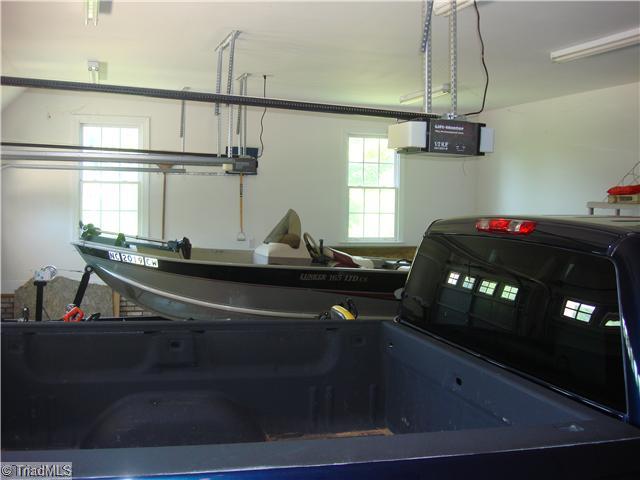 6365 Robinhood Road Pfafftown, NC 27040 - Photo 16 of 16 Other. Let Hubby and/or Dad have his own space. What more can he want? A place to park his truck and his boat along with storage for some of his favorite toys!