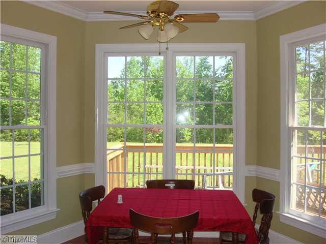 6365 Robinhood Road Pfafftown, NC 27040 - Photo 7 of 16 Kitchen. Enjoy your morning coffee in this large breakfast nook full of natural light to help get you going!