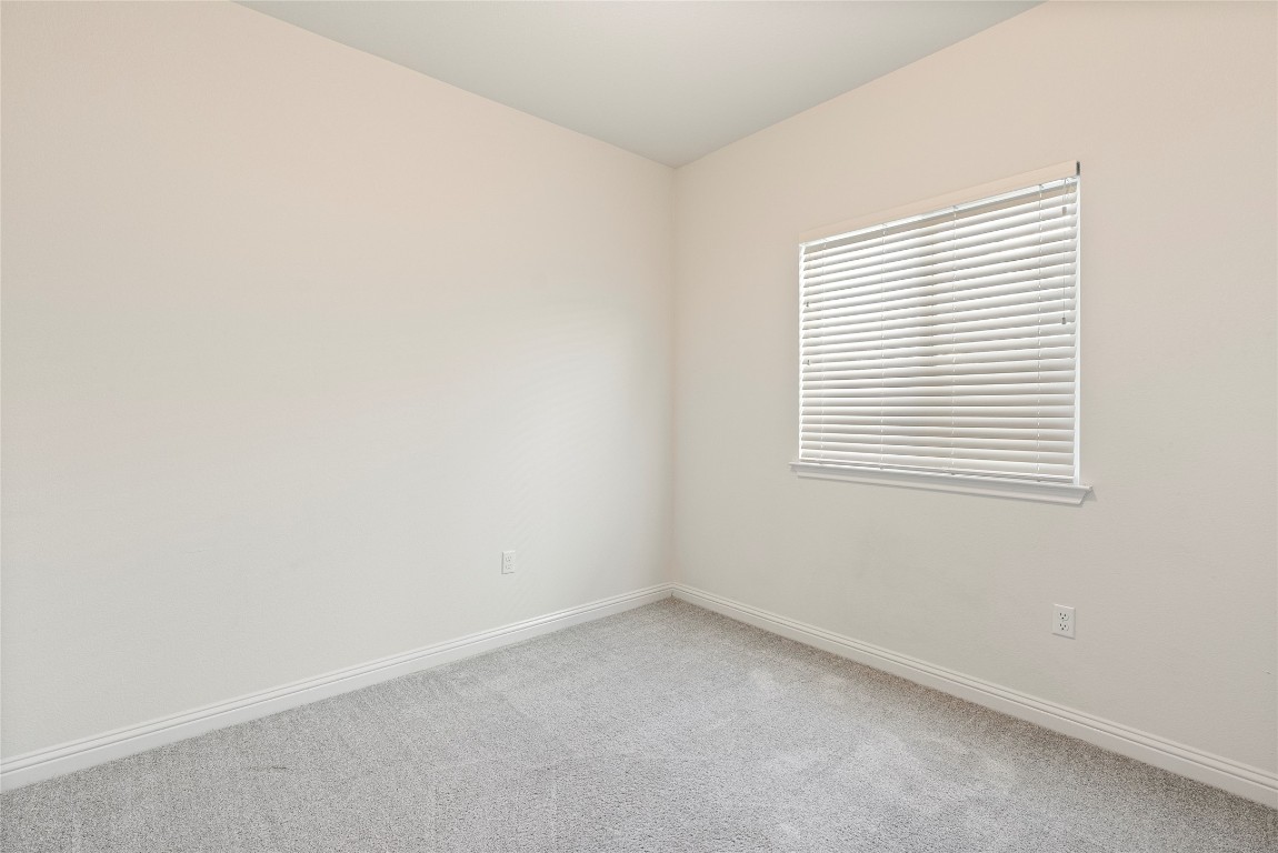 10708 Blacket Drive Austin, TX 78747 - Photo 11 of 20 an empty room with a window