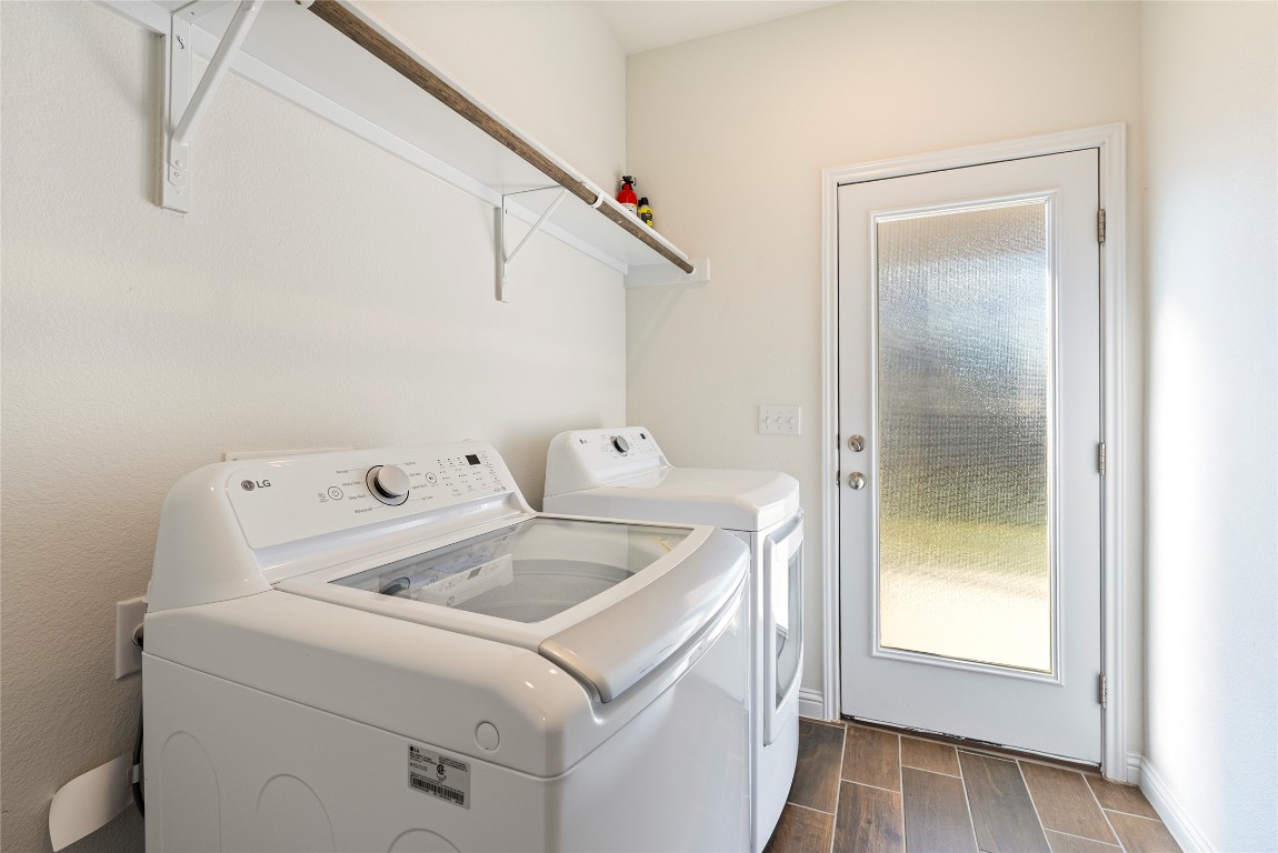 10708 Blacket Drive Austin, TX 78747 - Photo 13 of 20 a utility room with dryer and washer