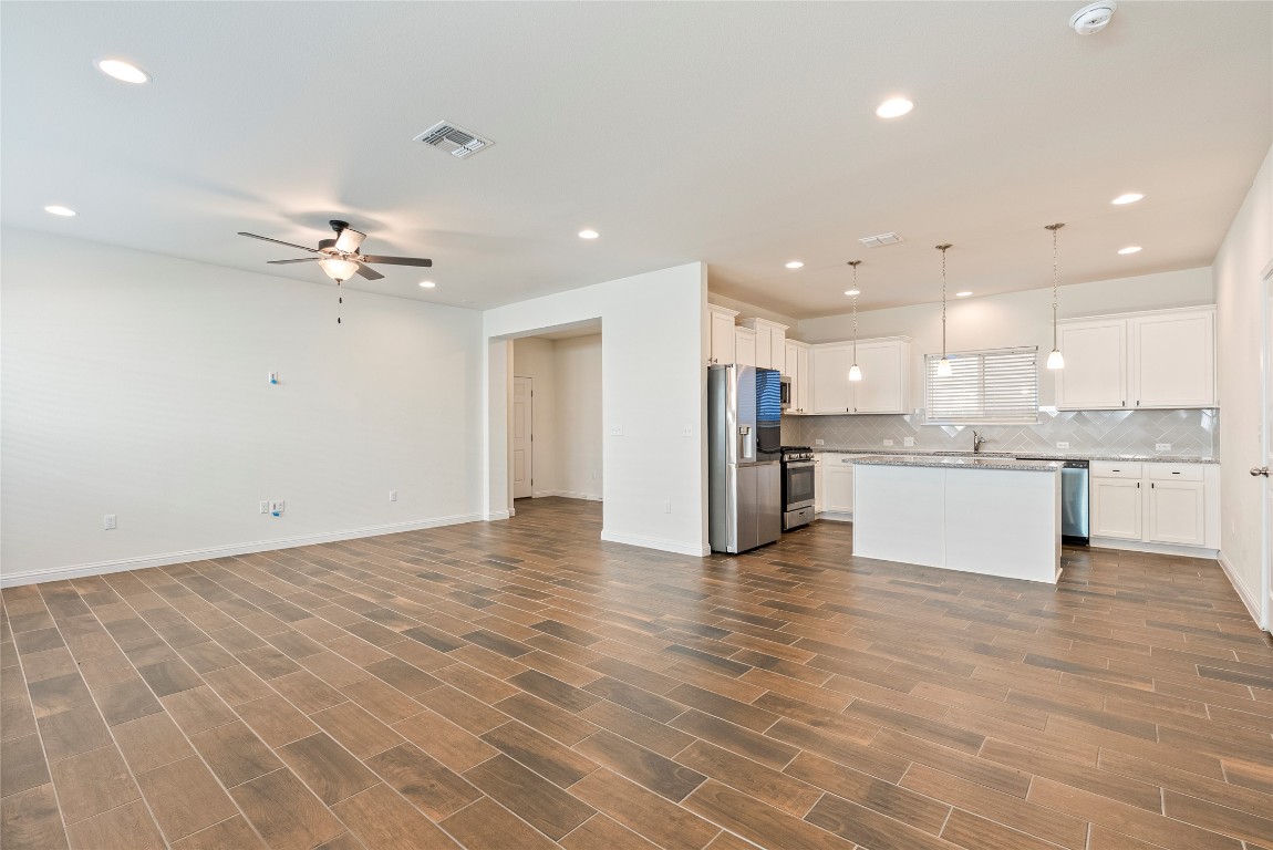 10708 Blacket Drive Austin, TX 78747 - Photo 20 of 20 a view of an empty room with a kitchen