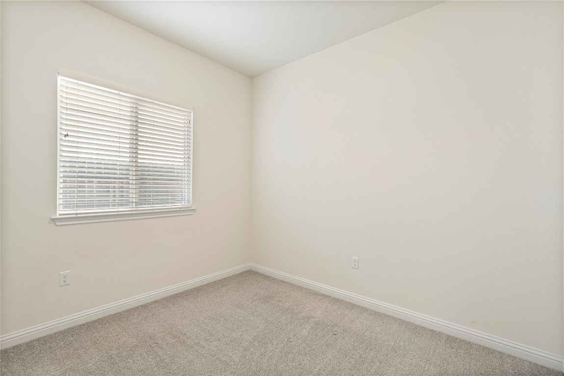 10708 Blacket Drive Austin, TX 78747 - Photo 9 of 20 an empty room with a window