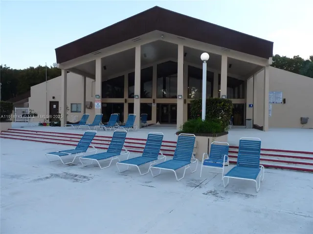 a view of a house with sitting area