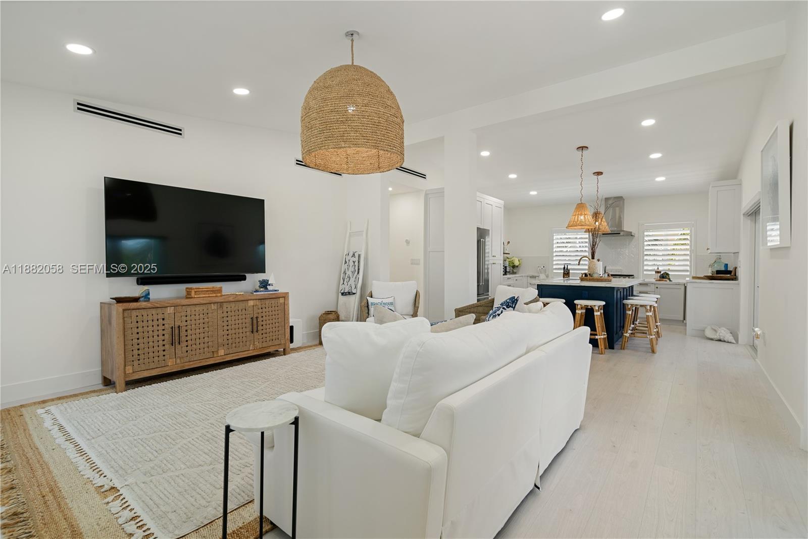 889 Ellen Drive Key Largo, FL 33037 - Photo 11 of 57 a living room with furniture and a flat screen tv