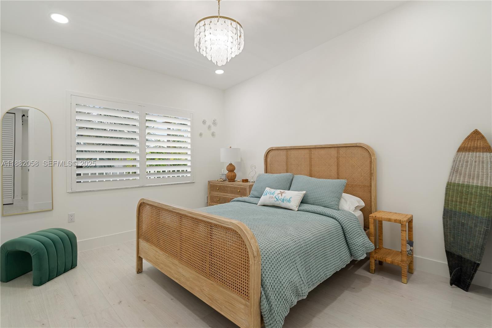 889 Ellen Drive Key Largo, FL 33037 - Photo 22 of 57 a bedroom with a bed and a window