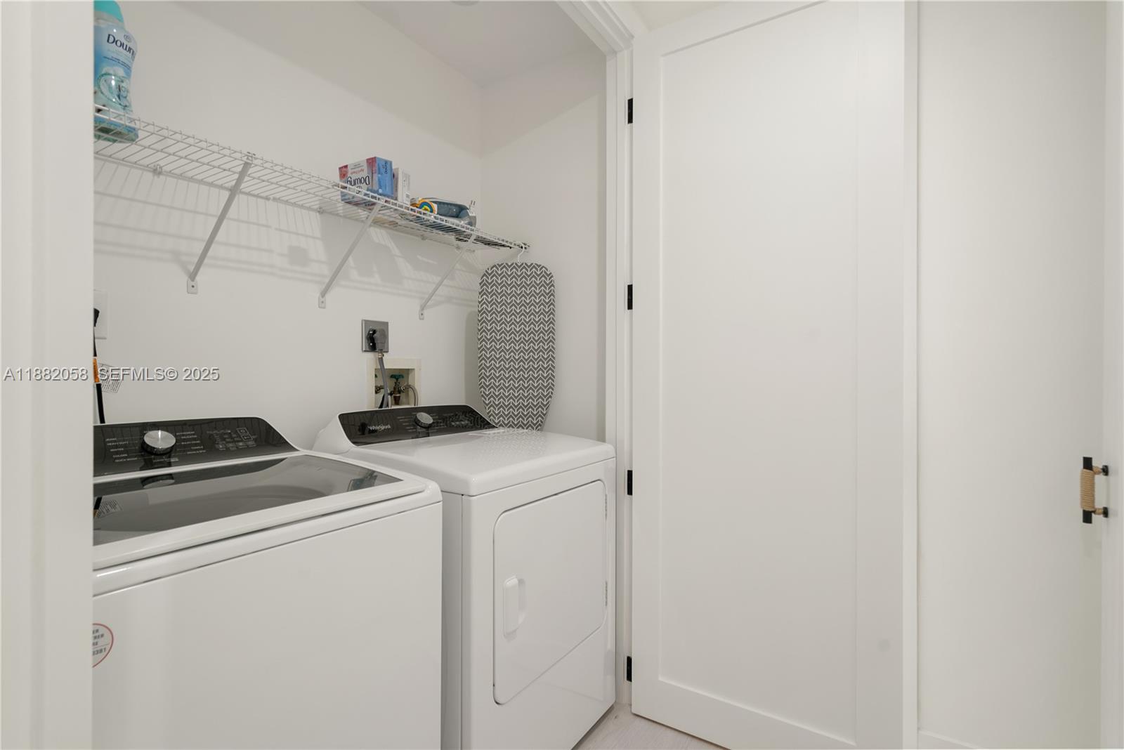 889 Ellen Drive Key Largo, FL 33037 - Photo 24 of 57 a utility room with dryer and washer
