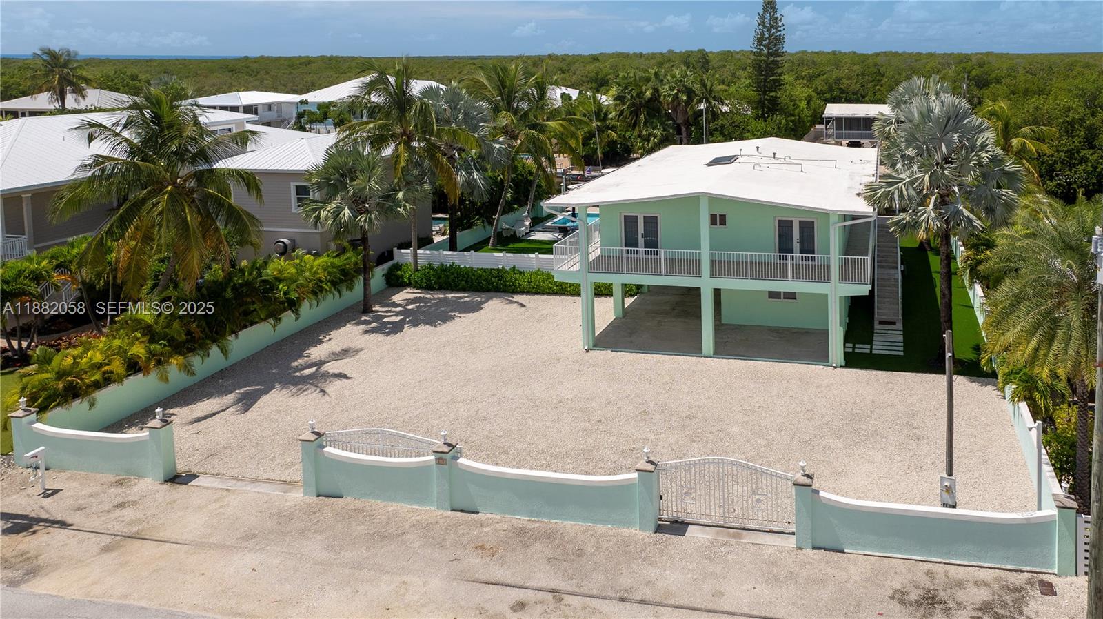 889 Ellen Drive Key Largo, FL 33037 - Photo 37 of 57 an aerial view of a house