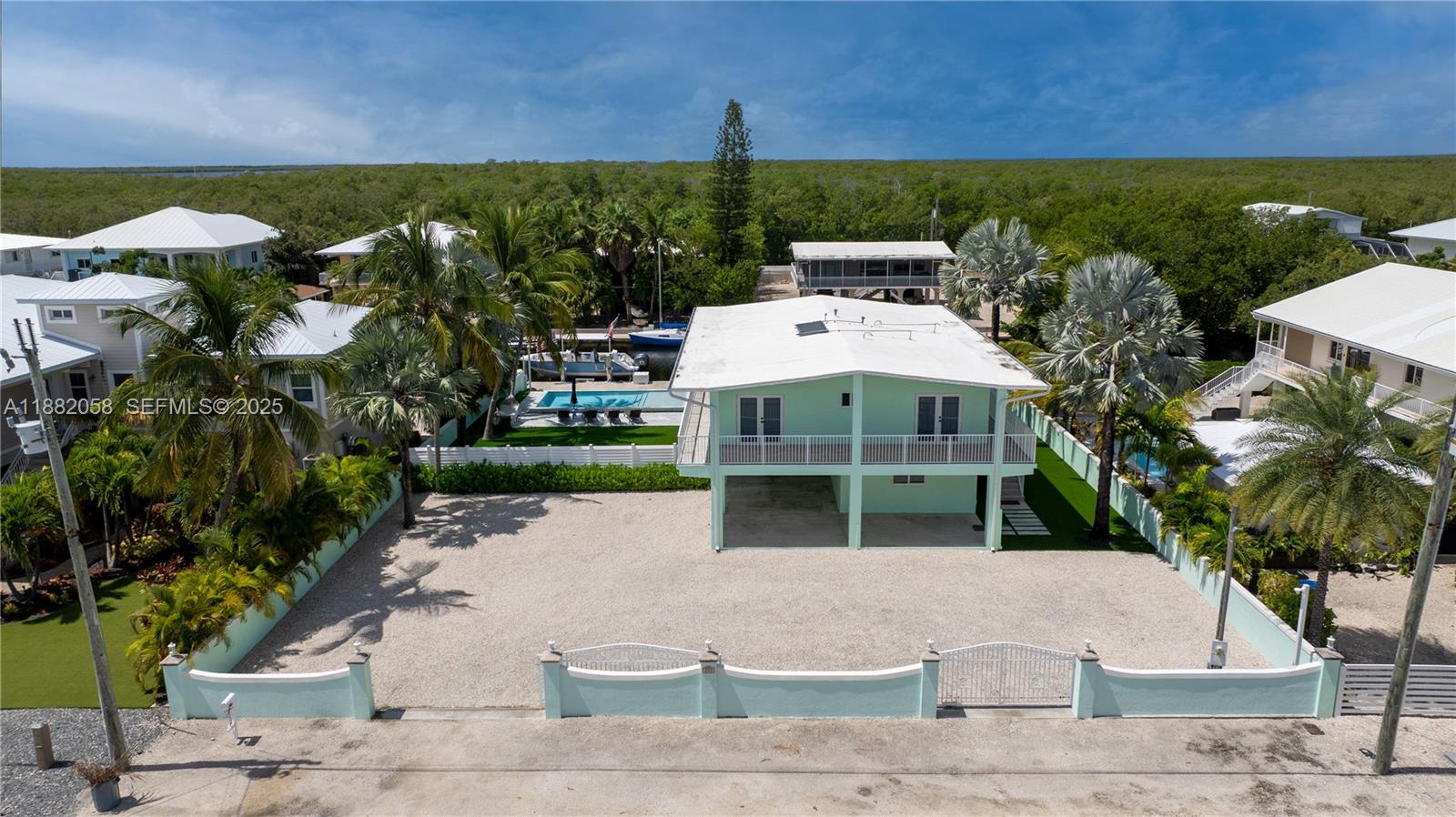 889 Ellen Drive Key Largo, FL 33037 - Photo 43 of 57 a view of a yard with plants