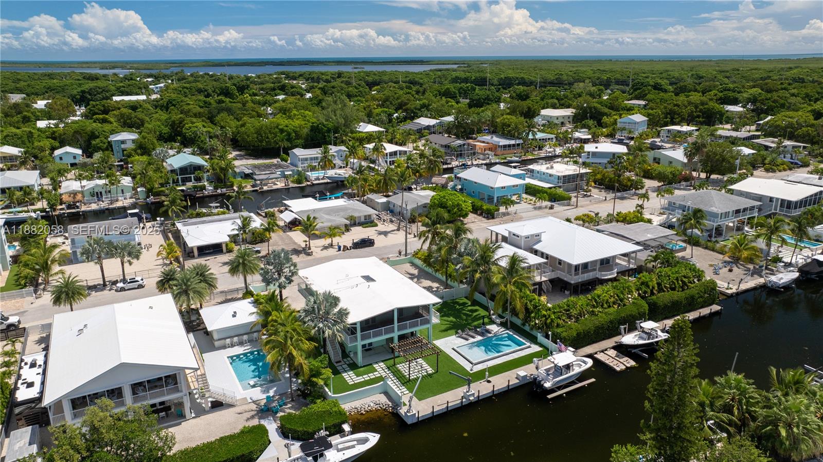 889 Ellen Drive Key Largo, FL 33037 - Photo 44 of 57 an aerial view of residential house with outdoor space and river