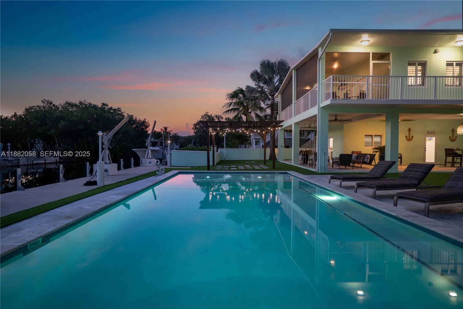 889 Ellen Drive Key Largo, FL 33037 - Photo 48 of 57 a view of an chairs and table in the patio