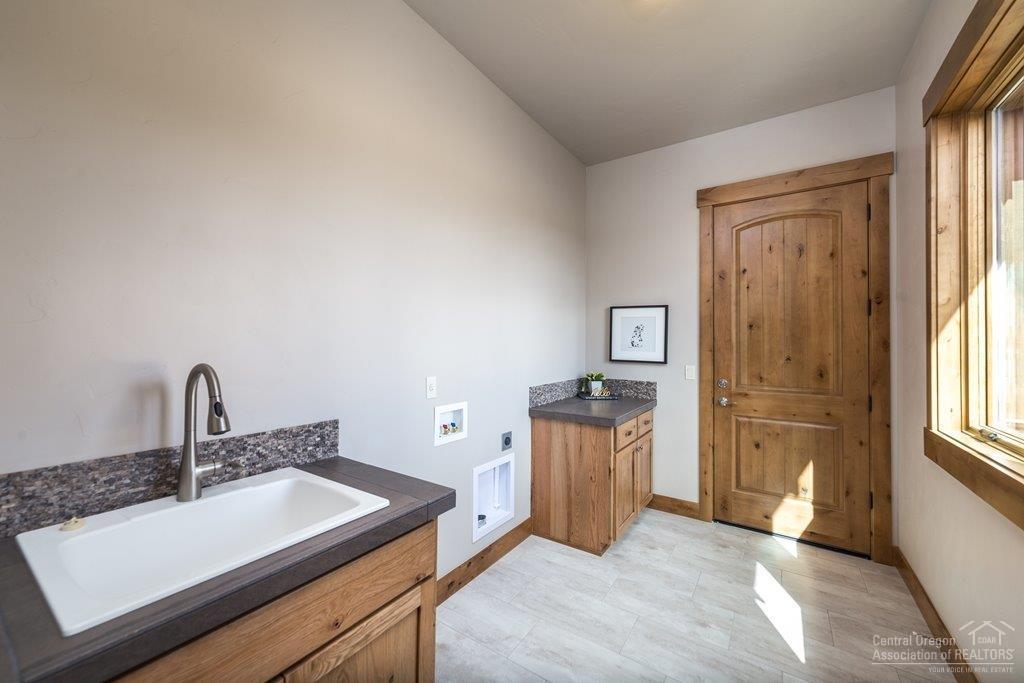 15920 South W Brasada Ranch Road Powell Butte, OR 97753 - Photo 12 of 25 a kitchen with a sink cabinets and appliances