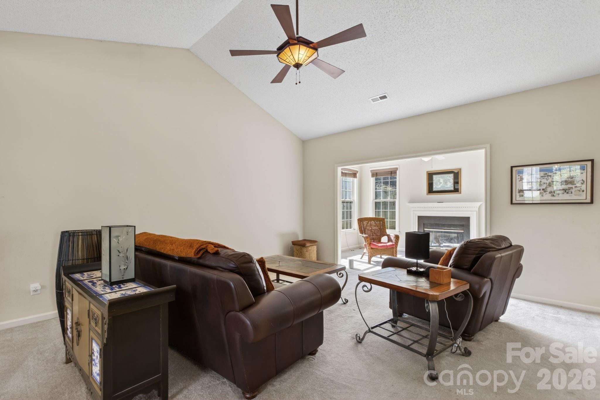 268 Farm Valley Road Fletcher, NC 28732 - Photo 8 of 30 a living room with furniture and a lamp