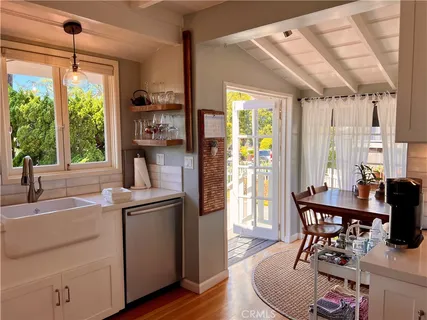 a view of living room with furniture and window