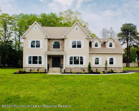 409 Jackson Mills Road Freehold, NJ 07728 - Photo 1 of 35 a front view of house with yard