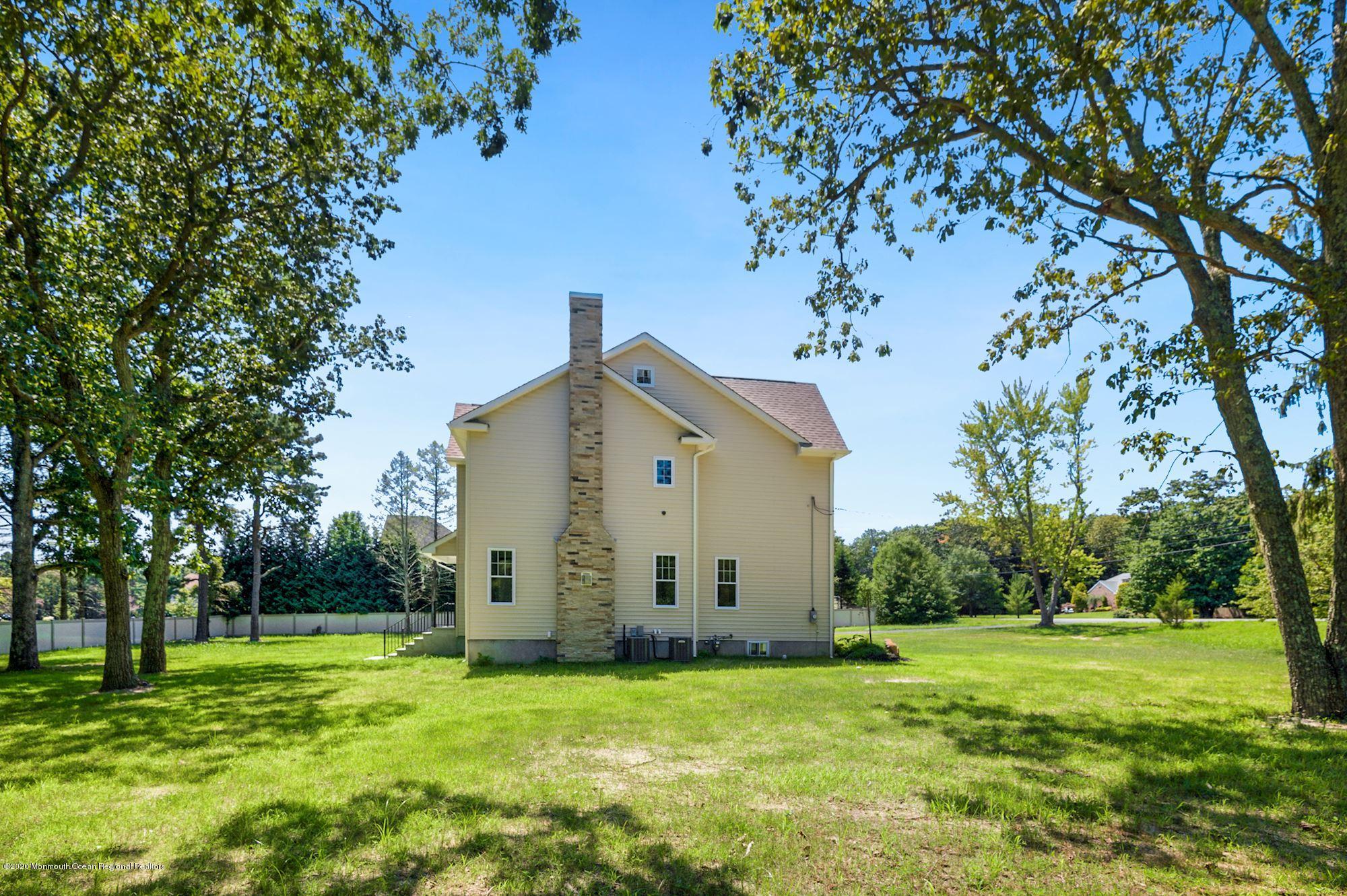 409 Jackson Mills Road Freehold, NJ 07728 - Photo 32 of 35 a view of a house with backyard