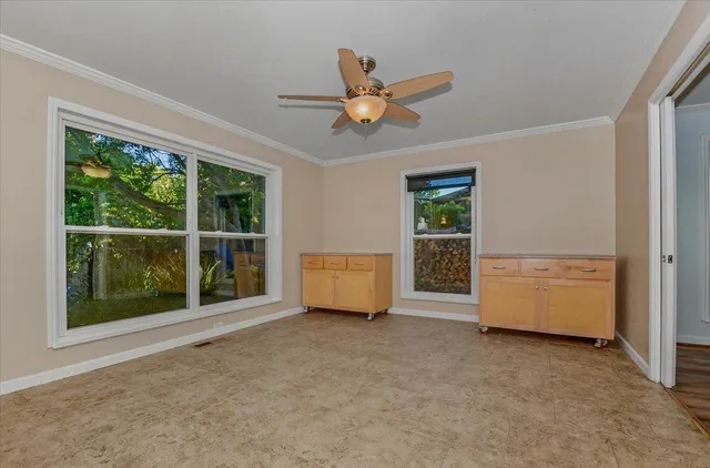 a kitchen with stainless steel appliances granite countertop a sink and cabinets