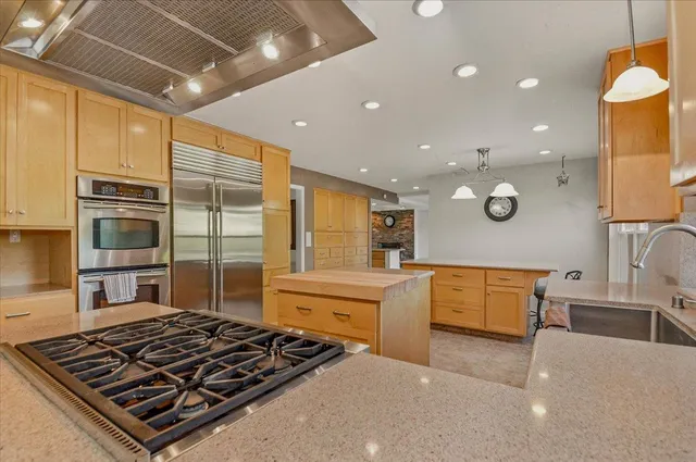 a view of storage and utility room with a sink