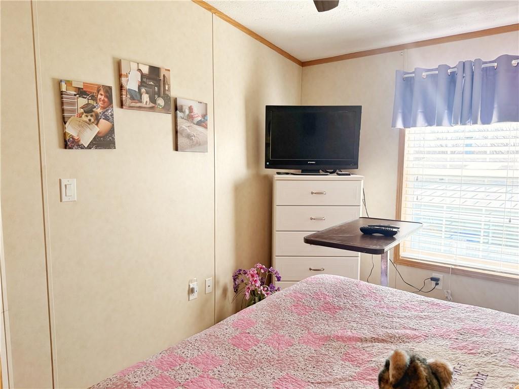 137 York Road Cranberry Township, PA 16066 - Photo 21 of 44 a bedroom with a bed and a flat screen tv