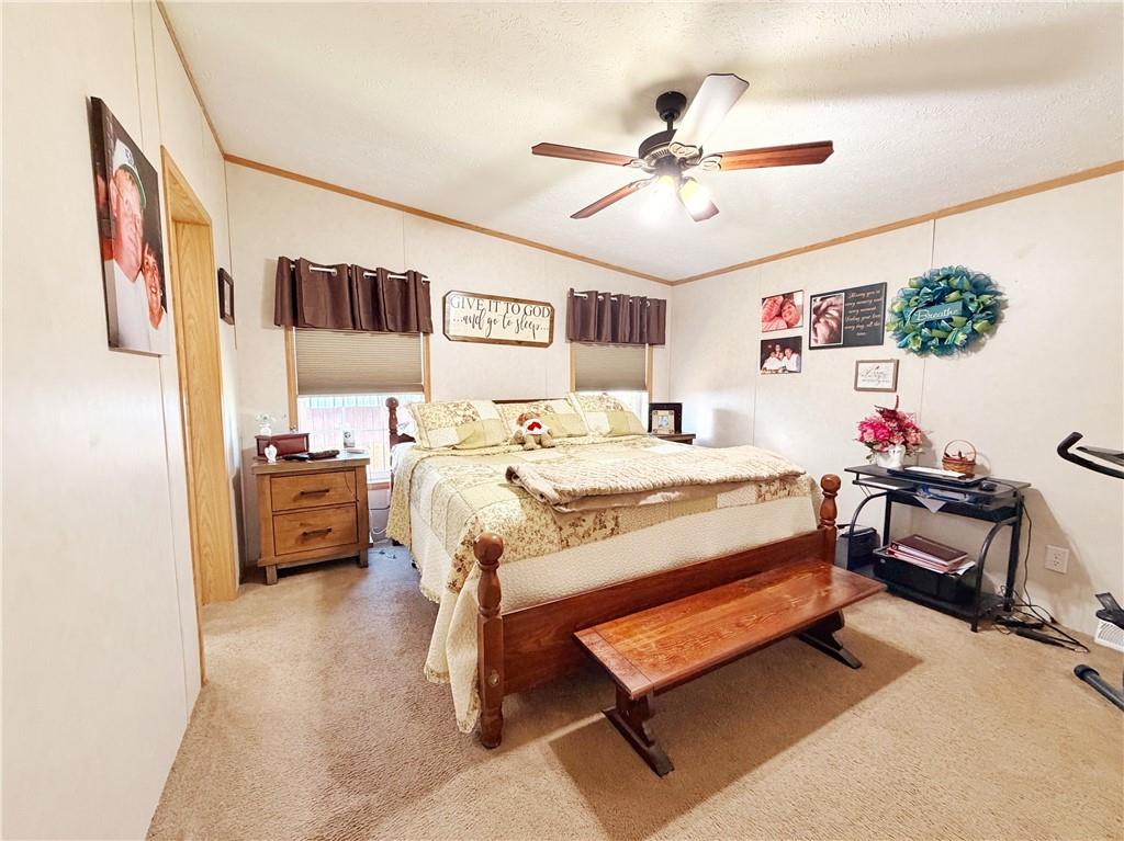 137 York Road Cranberry Township, PA 16066 - Photo 28 of 44 a bedroom with a bed and a chandelier