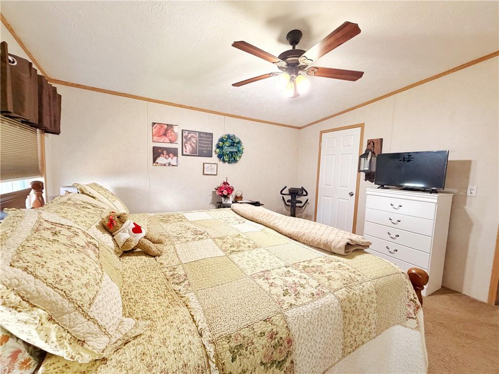 137 York Road Cranberry Township, PA 16066 - Photo 29 of 44 a bedroom with a bed and a chandelier