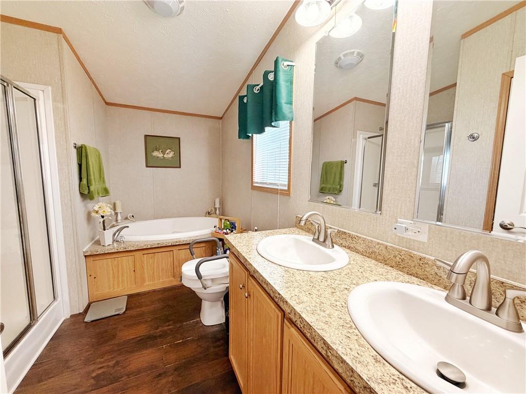 137 York Road Cranberry Township, PA 16066 - Photo 31 of 44 a bathroom with a granite countertop sink mirror vanity bathtub and a toilet