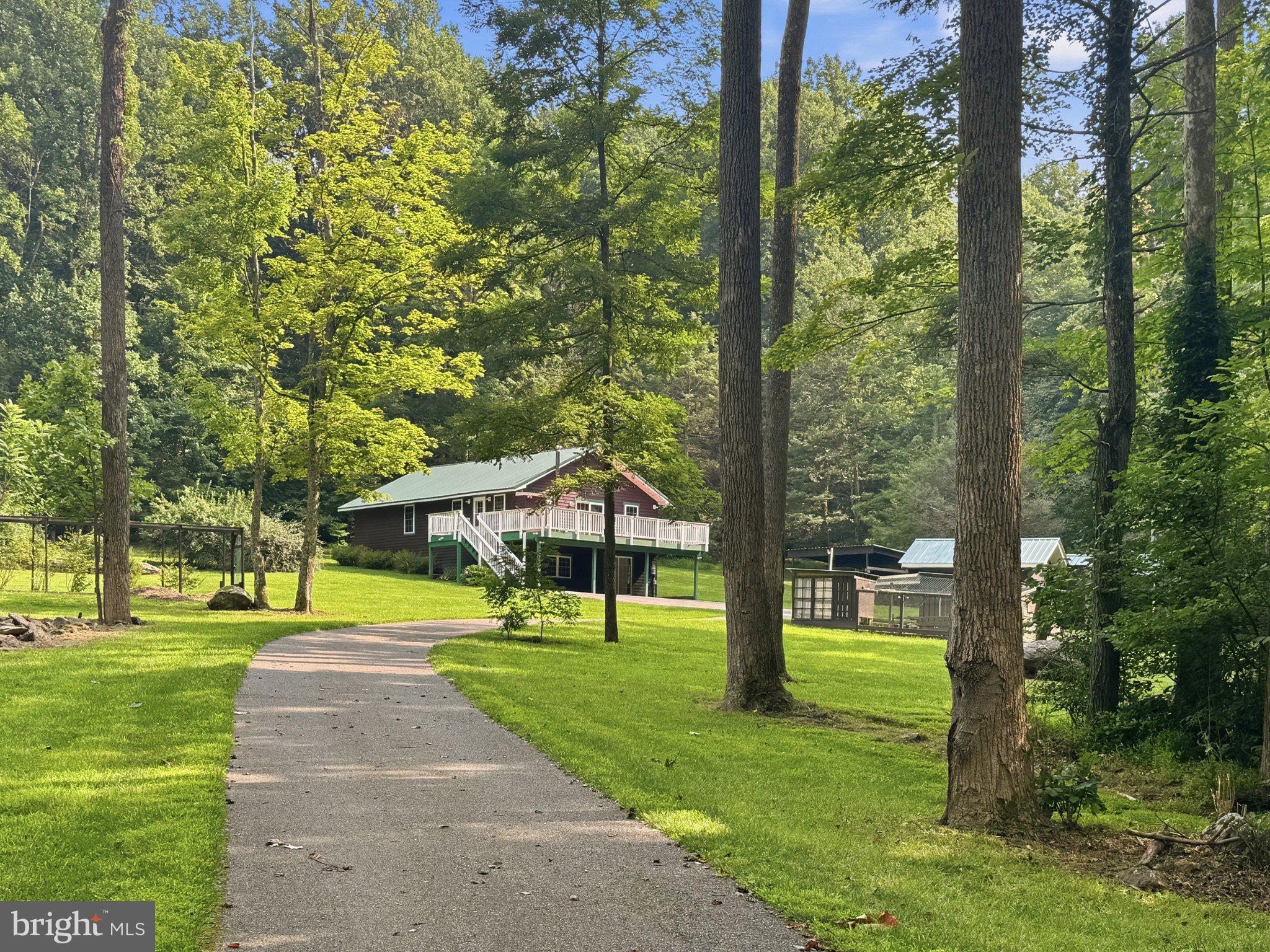 24105 Raven Rock Road Smithsburg, MD 21783 - Photo 1 of 51 Serene pathway to a charming retreat.