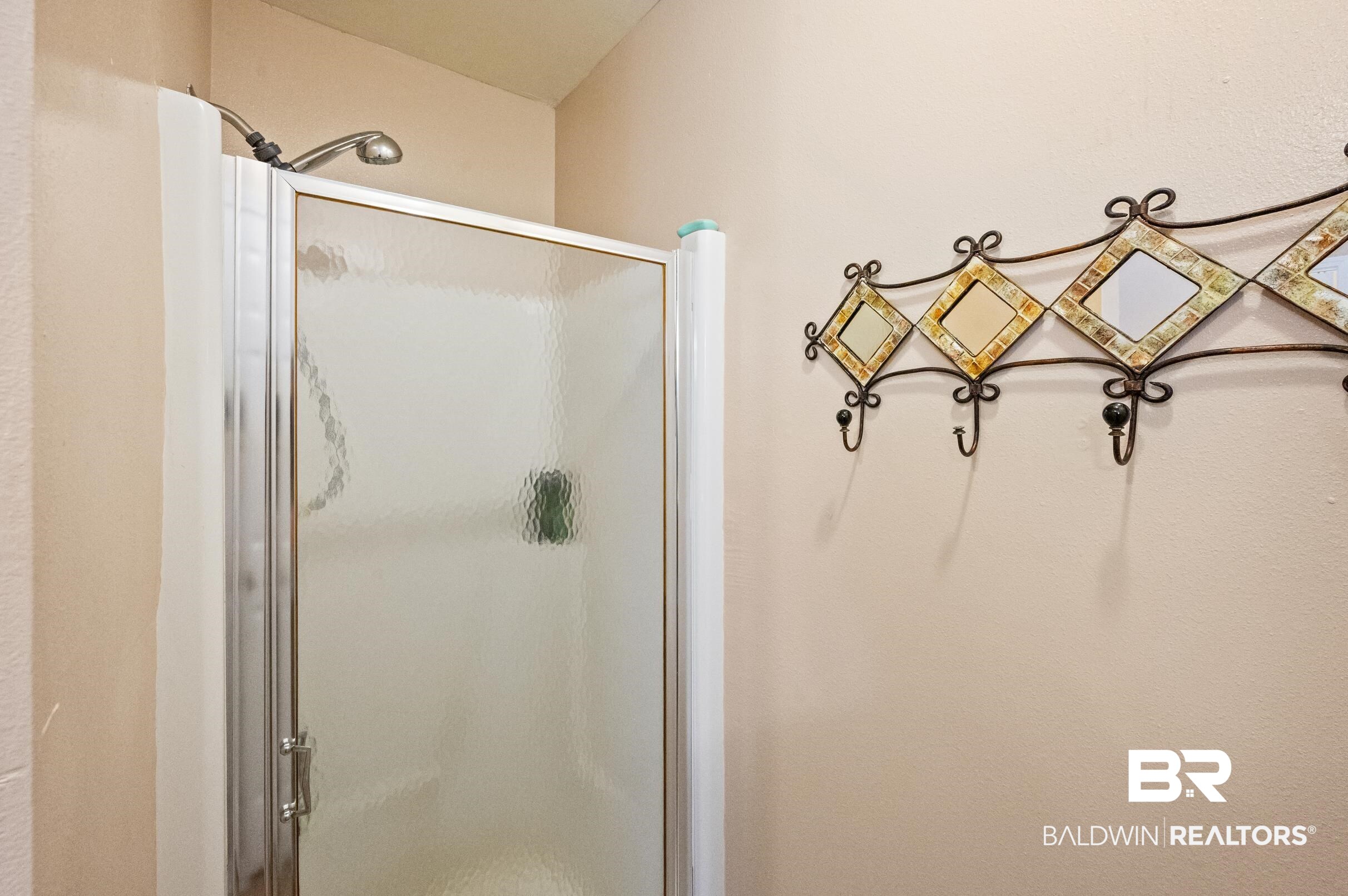 1192 Ridgewood Drive Lillian, AL 36549 - Photo 16 of 36 Bathroom with a shower with door