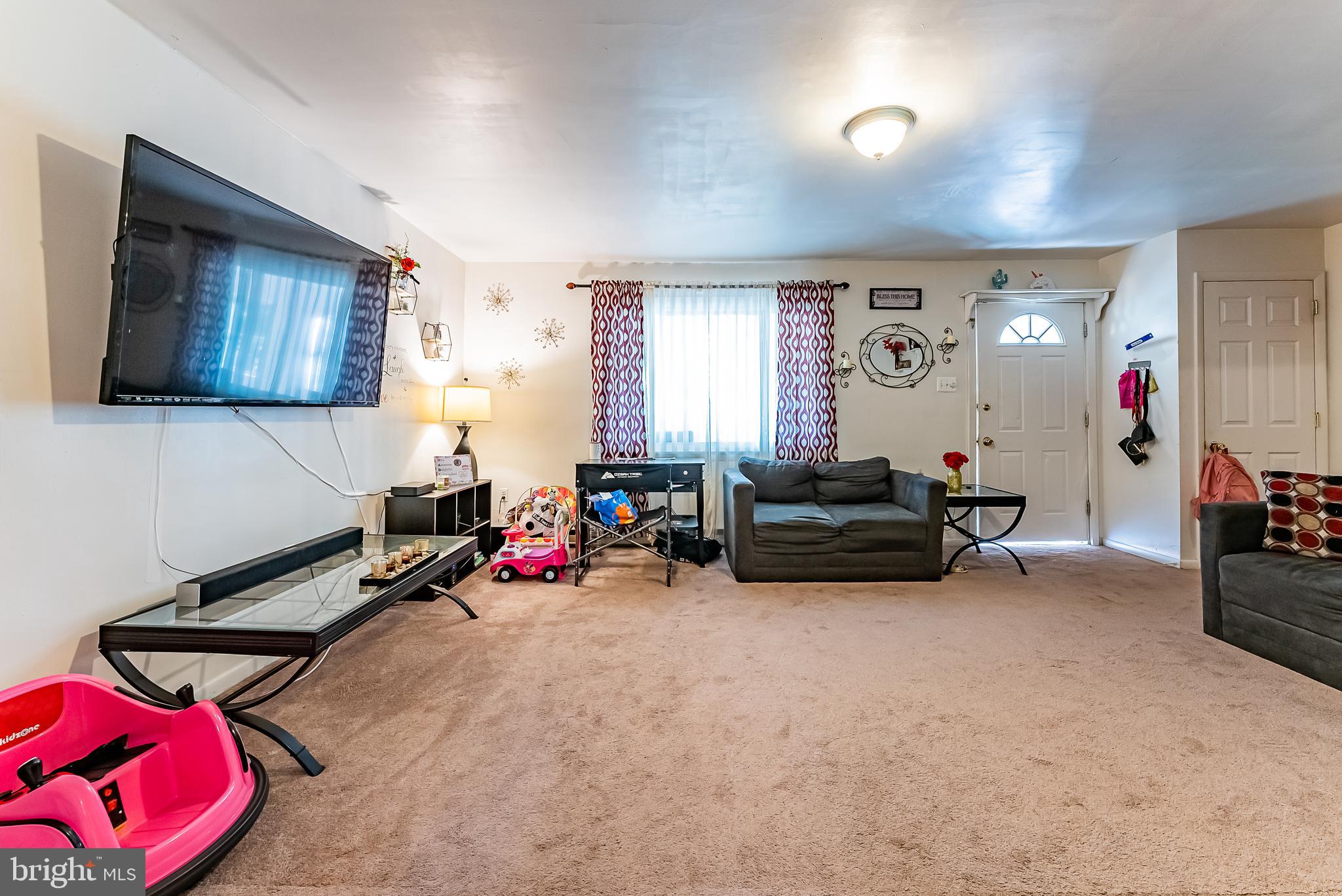 1393 North Valley Road Pottstown, PA 19464 - Photo 7 of 25 Spacious, carpeted living room on upper level
