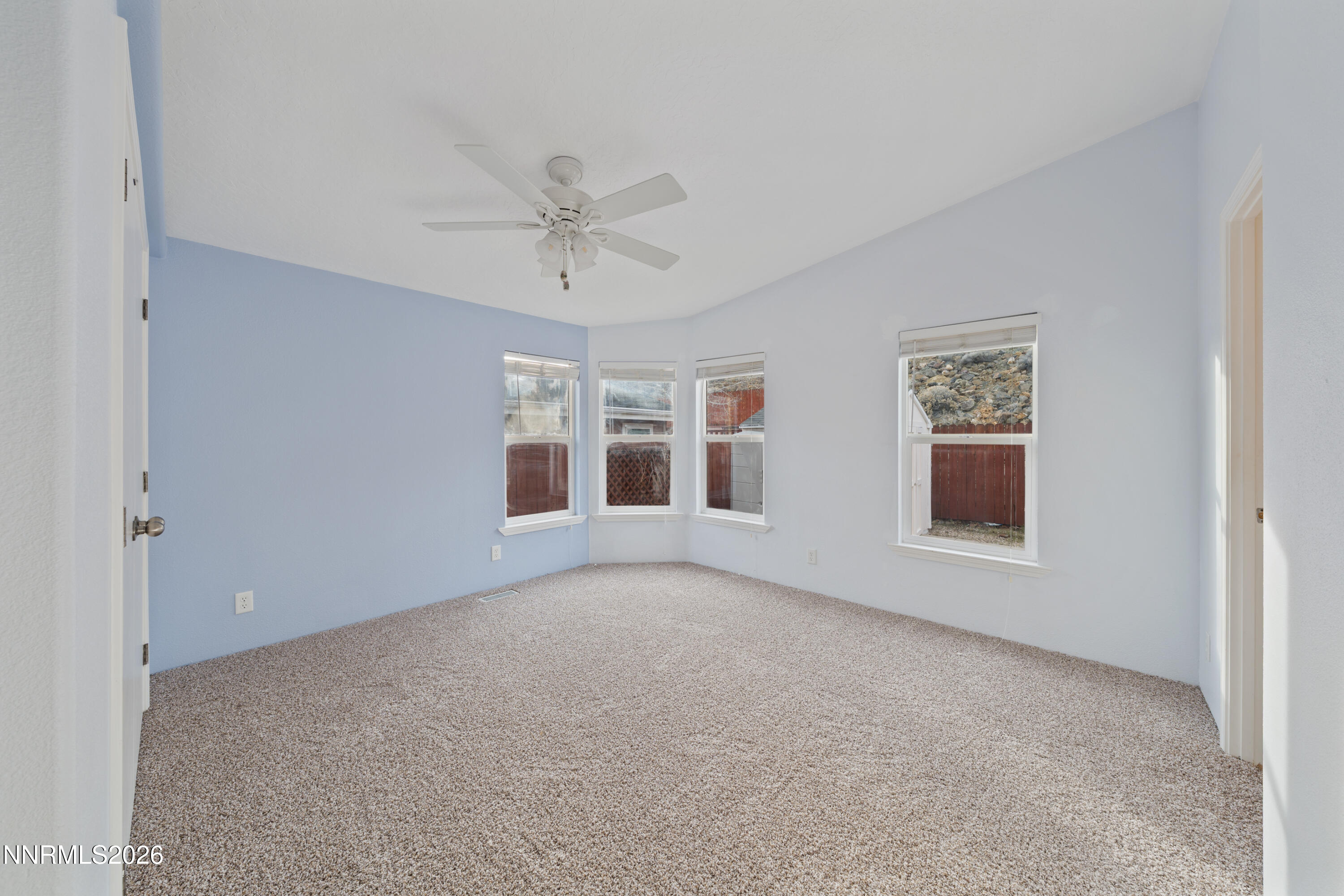 5277 Mt Dana Drive Reno, NV 89506 - Photo 12 of 49 a view of an empty room with a window