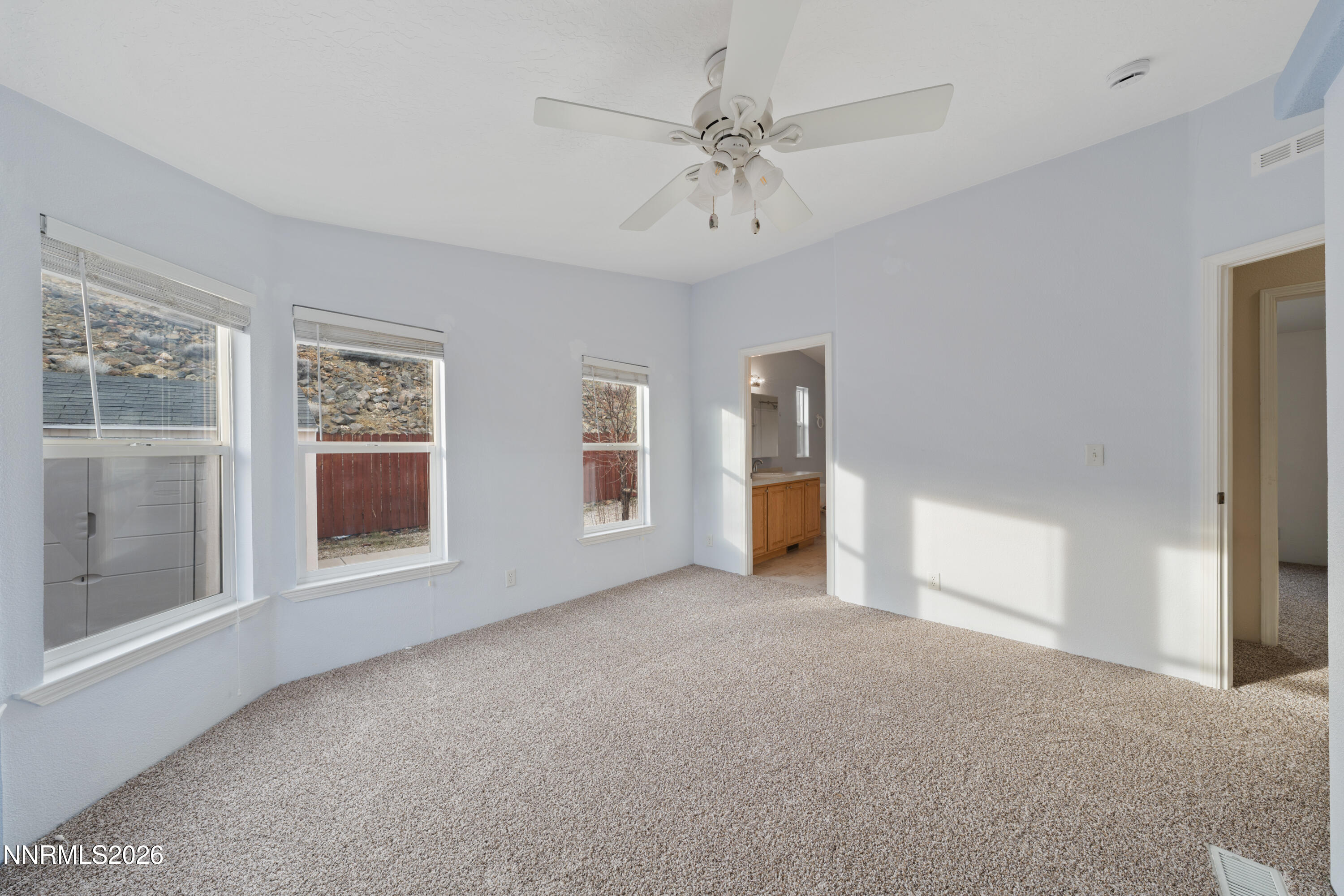 5277 Mt Dana Drive Reno, NV 89506 - Photo 14 of 49 a view of an empty room with a window