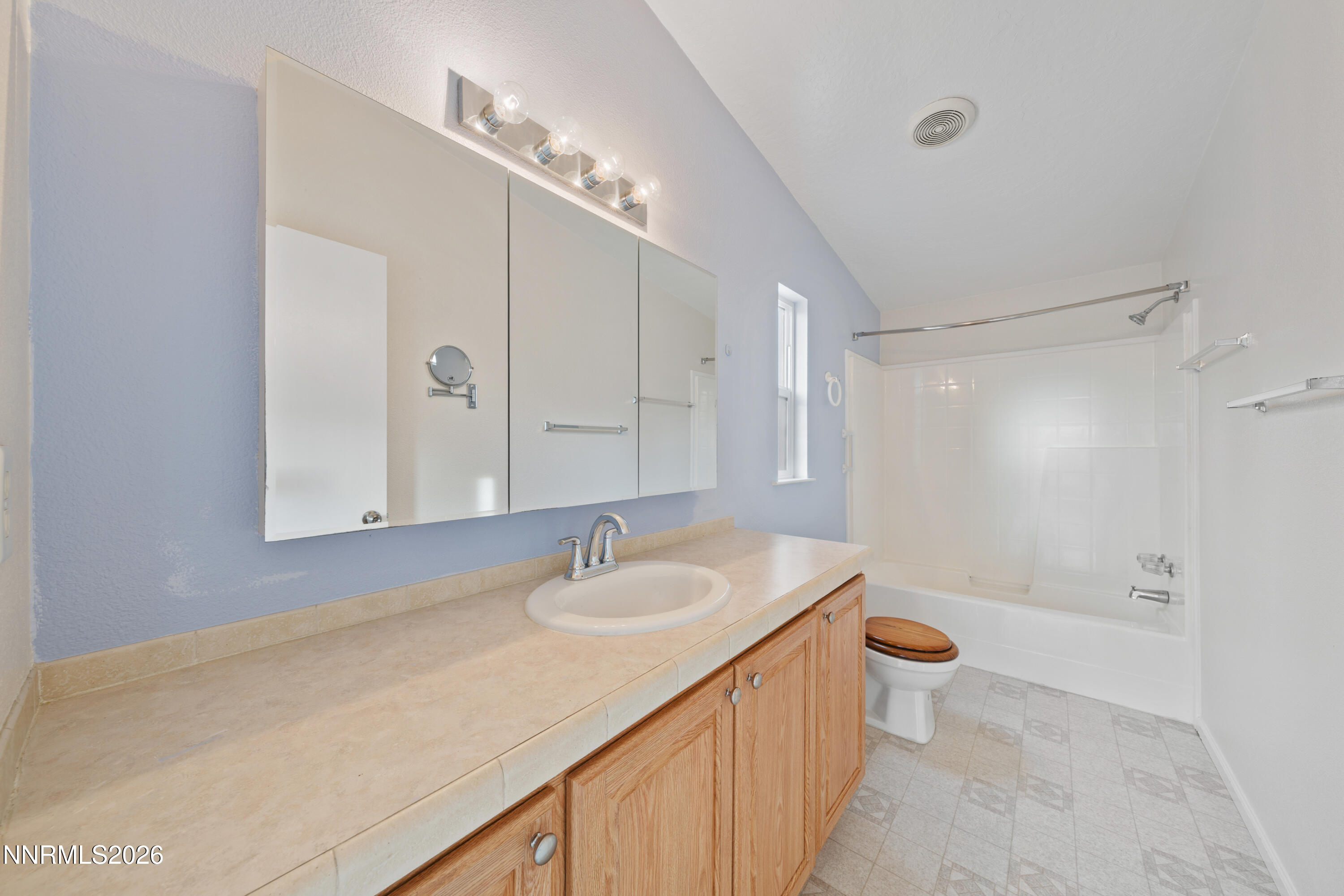 5277 Mt Dana Drive Reno, NV 89506 - Photo 18 of 49 a bathroom with a sink a toilet and shower