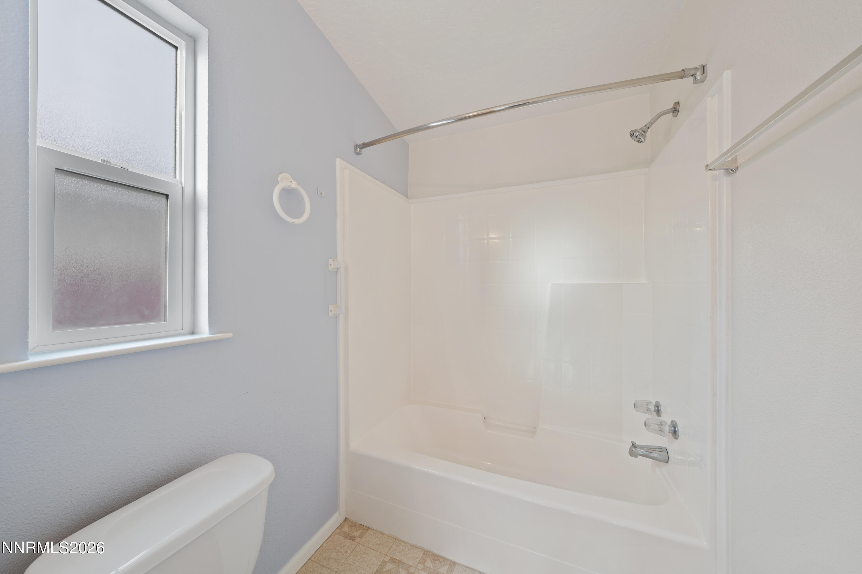 5277 Mt Dana Drive Reno, NV 89506 - Photo 19 of 49 a bathroom with a bathtub and a shower