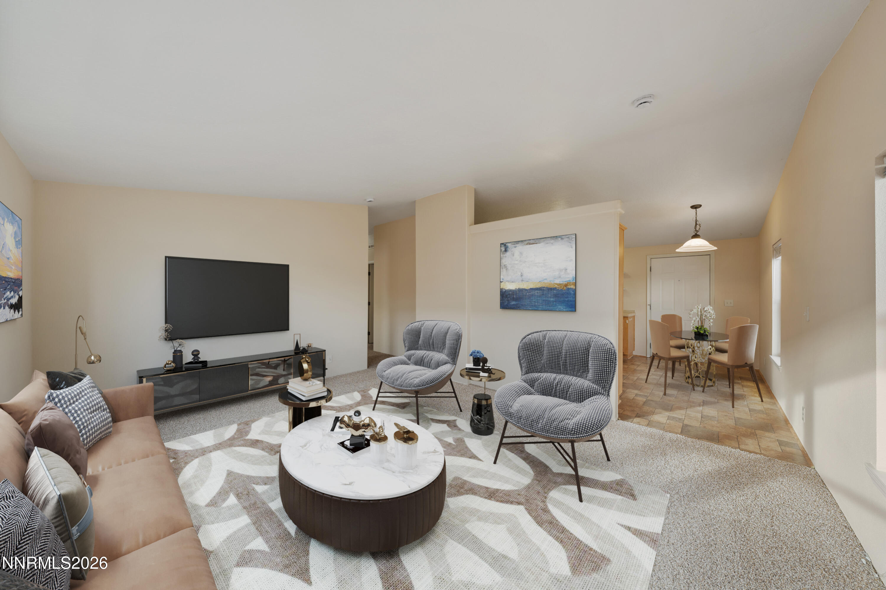 5277 Mt Dana Drive Reno, NV 89506 - Photo 2 of 49 a living room with furniture and a flat screen tv