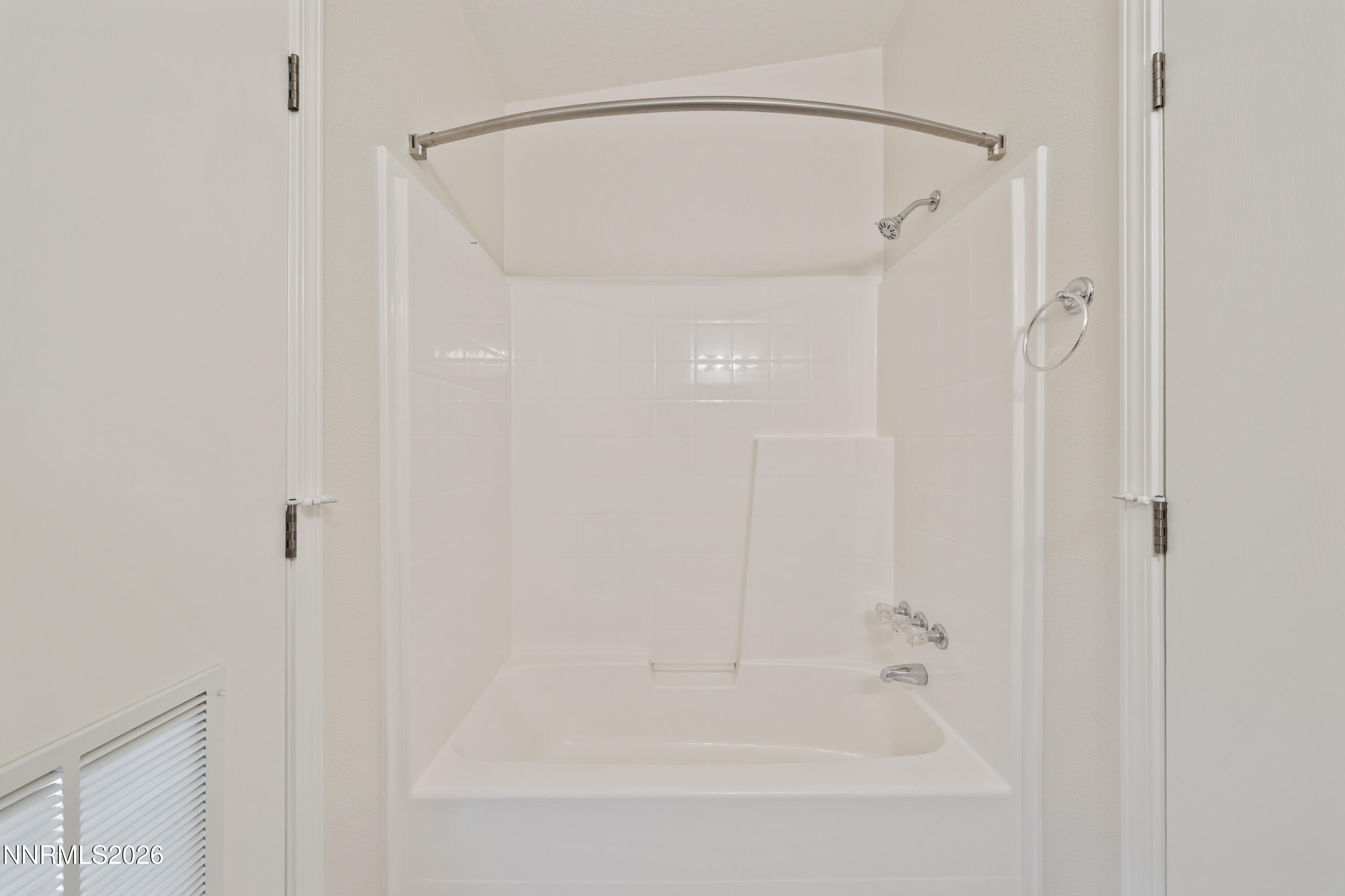 5277 Mt Dana Drive Reno, NV 89506 - Photo 28 of 49 a bathroom with a glass shower door