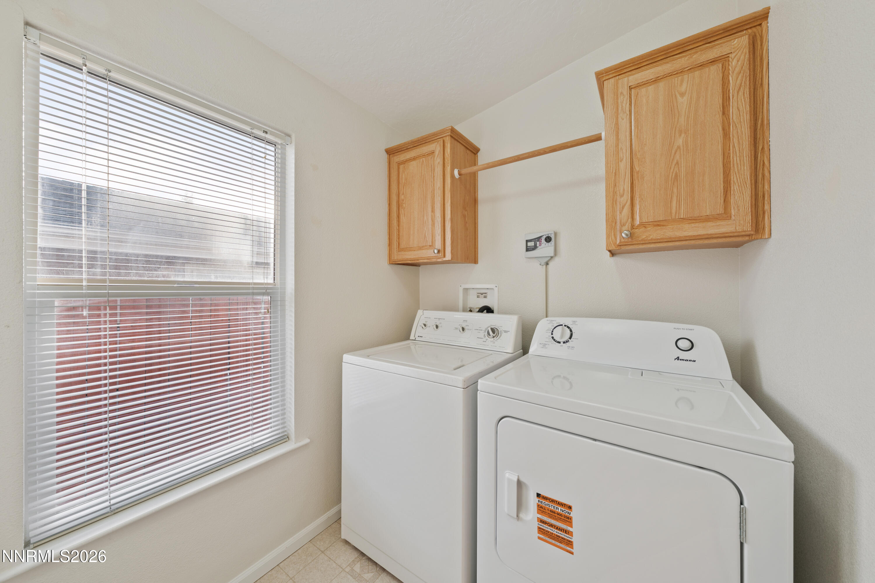 5277 Mt Dana Drive Reno, NV 89506 - Photo 30 of 49 a utility room with dryer and washer