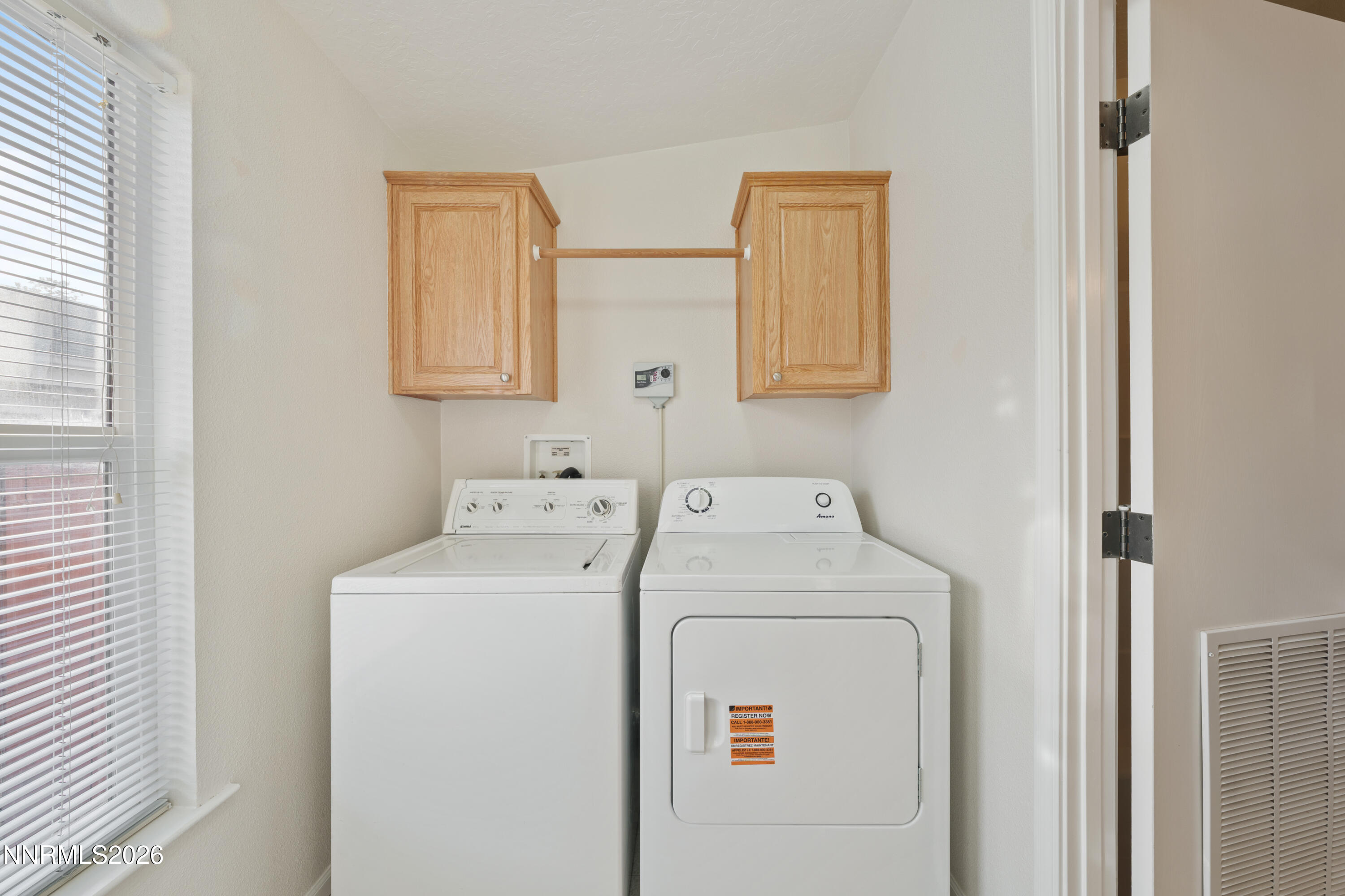 5277 Mt Dana Drive Reno, NV 89506 - Photo 31 of 49 a utility room with dryer and washer